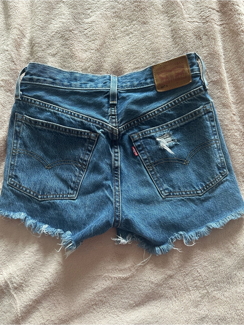 Levi's Medium Blue Denim Cutoff Shorts with Frayed Hem